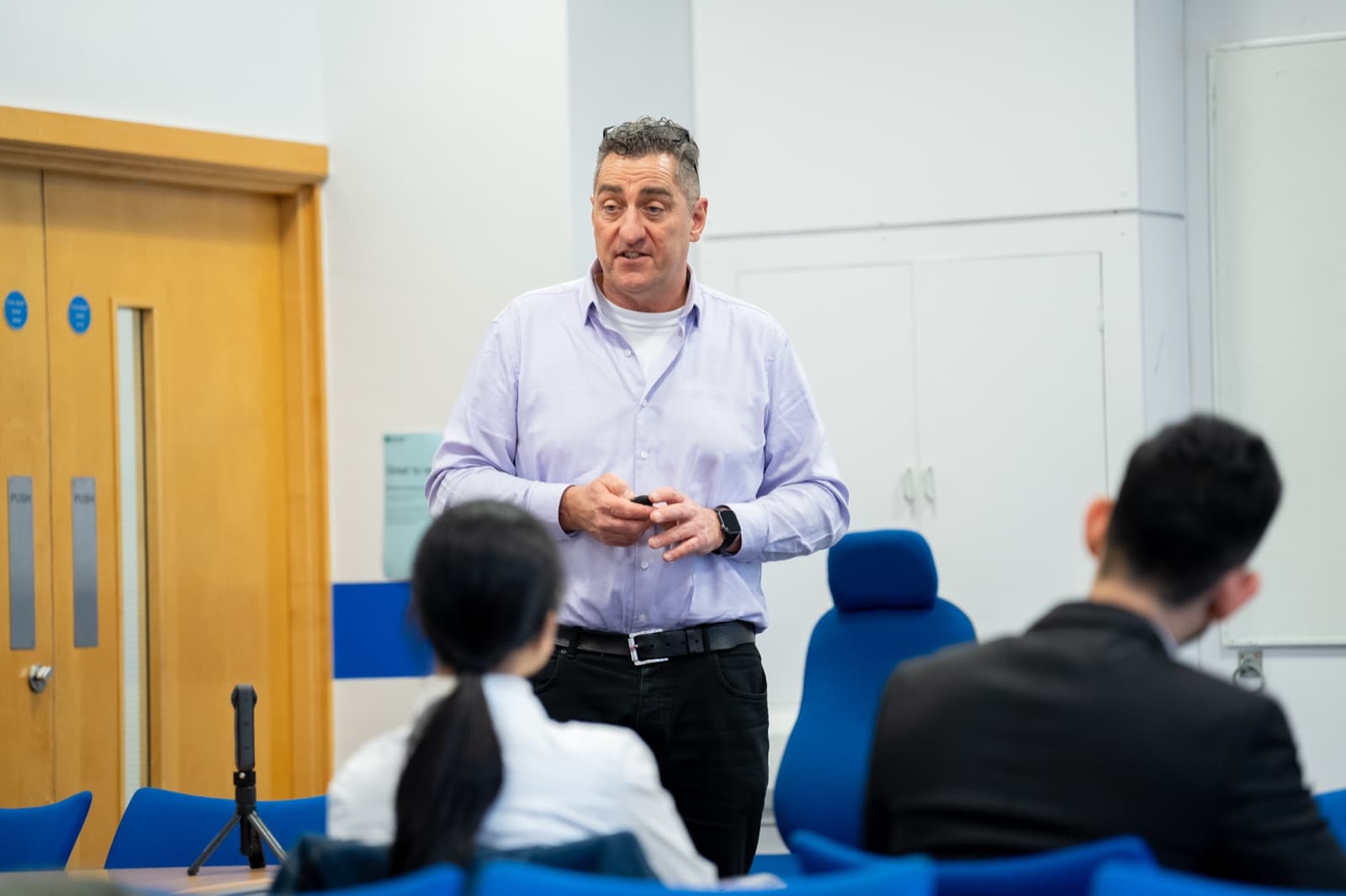 Alan presenting to a team